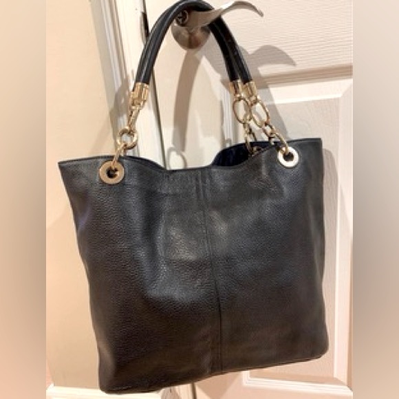 Tommy Hilfiger - Picture 1 of 8